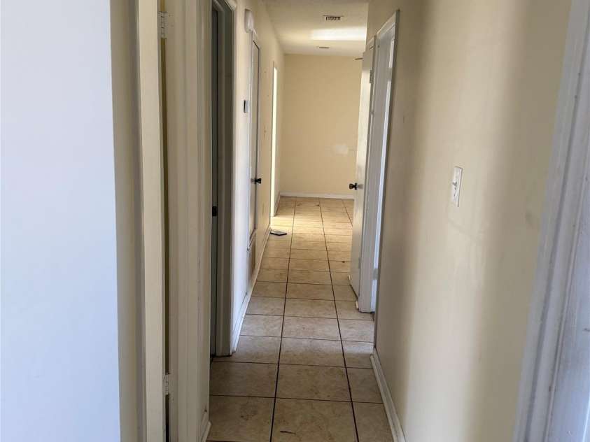 1314 Milan Road, Charlotte, NC 28216.  MLS# CAR4190638, YatesRealty ID 1390. Ceramic tiles in the hallway as well.