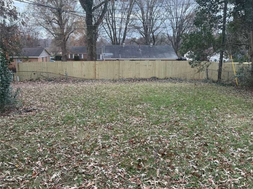 1314 Milan Road, Charlotte, NC 28216.  MLS# CAR4190638, YatesRealty ID 1390. Flat backyard
