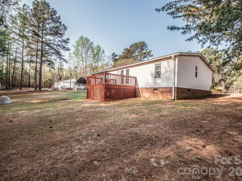 44082 Harper Hearne Road, New London, NC 28127.  MLS# CAR4362466, YatesRealty ID 13900. Backyard