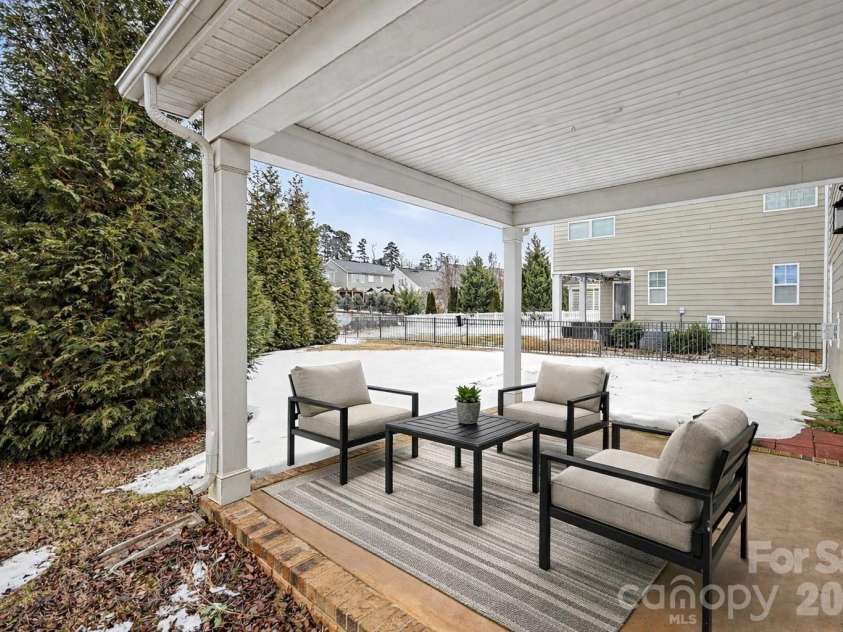 109 Creekside Crossing Lane, Mooresville, NC 28117.  MLS# CAR4343305, YatesRealty ID 13902. Patio - Virtually Staged