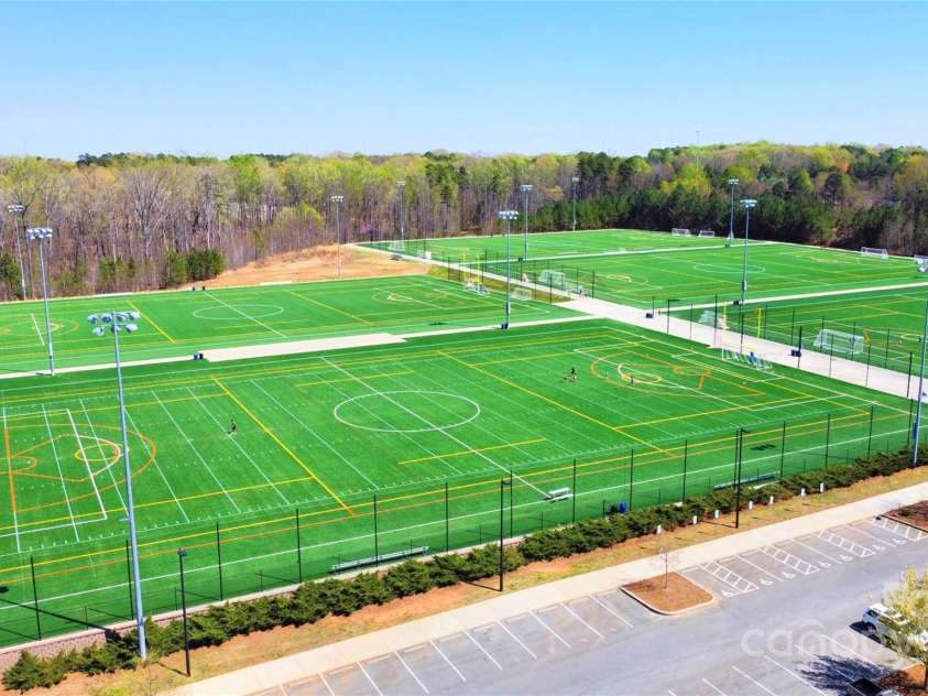 4102 Harmony Hills Drive, Matthews, NC 28104.  MLS# CAR4235594, YatesRealty ID 13904. Sportsplex