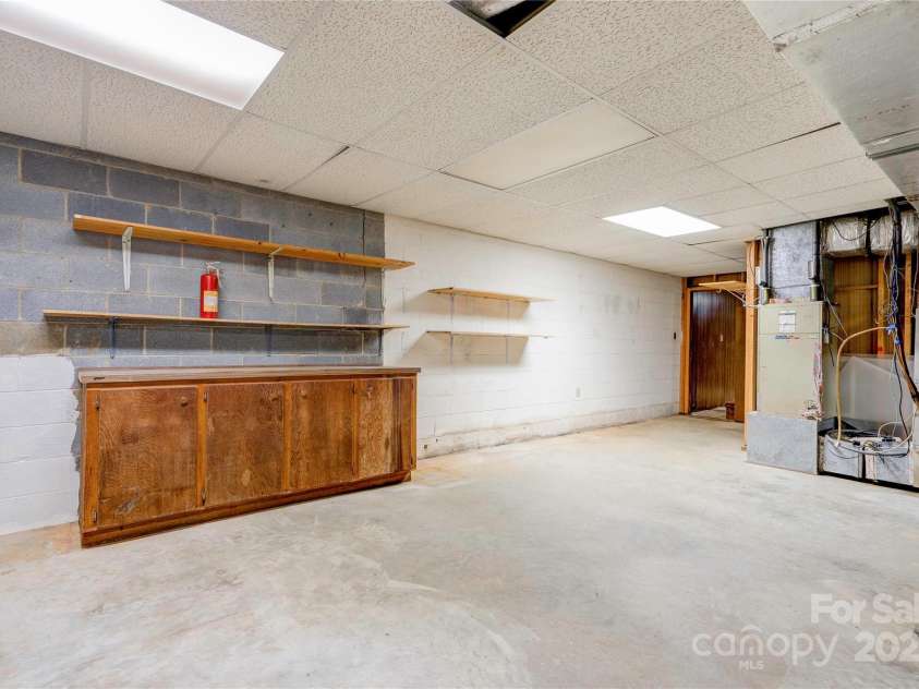 1701 Cedar Creek Road, Shelby, NC 28152.  MLS# CAR4298756, YatesRealty ID 13907. Basement Workshop