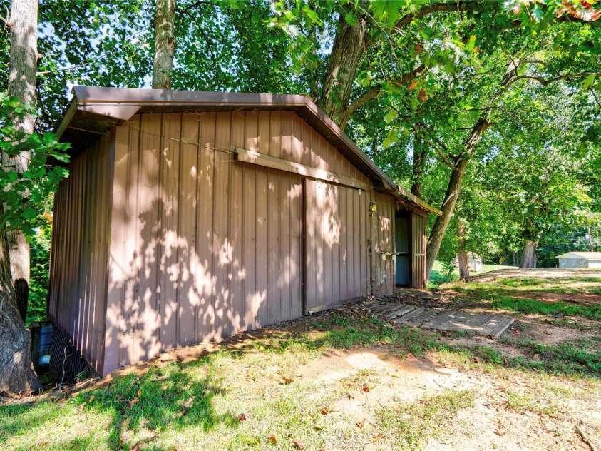 1701 Cedar Creek Road, Shelby, NC 28152.  MLS# CAR4298756, YatesRealty ID 13907. Storage Building is large.