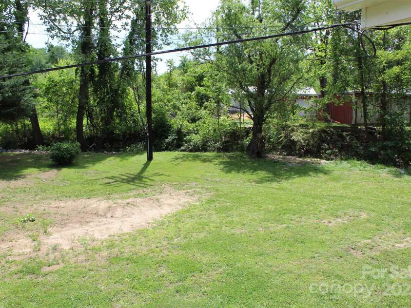 68 Rector Street, Tryon, NC 28782.  MLS# CAR4254704, YatesRealty ID 13907. 