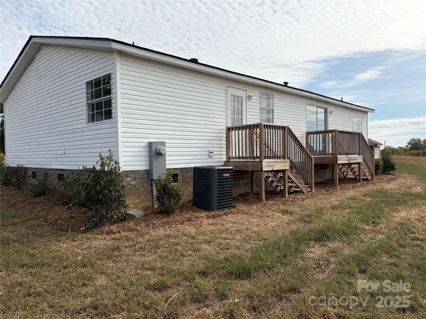 1610 Rocky River Road, Monroe, NC 28112.  MLS# CAR4315735, YatesRealty ID 1391. 