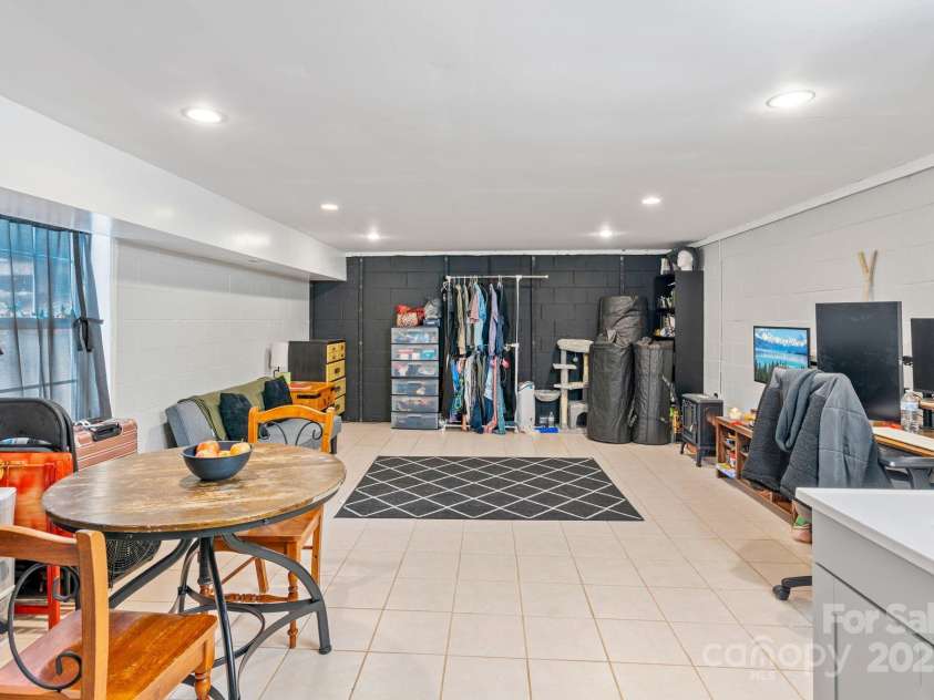 308 Browntown Road, Leicester, NC 28748.  MLS# CAR4216858, YatesRealty ID 13916. Basement area with separate entrance