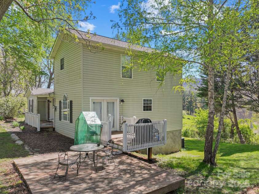 308 Browntown Road, Leicester, NC 28748.  MLS# CAR4216858, YatesRealty ID 13916. Deck off of kitchen