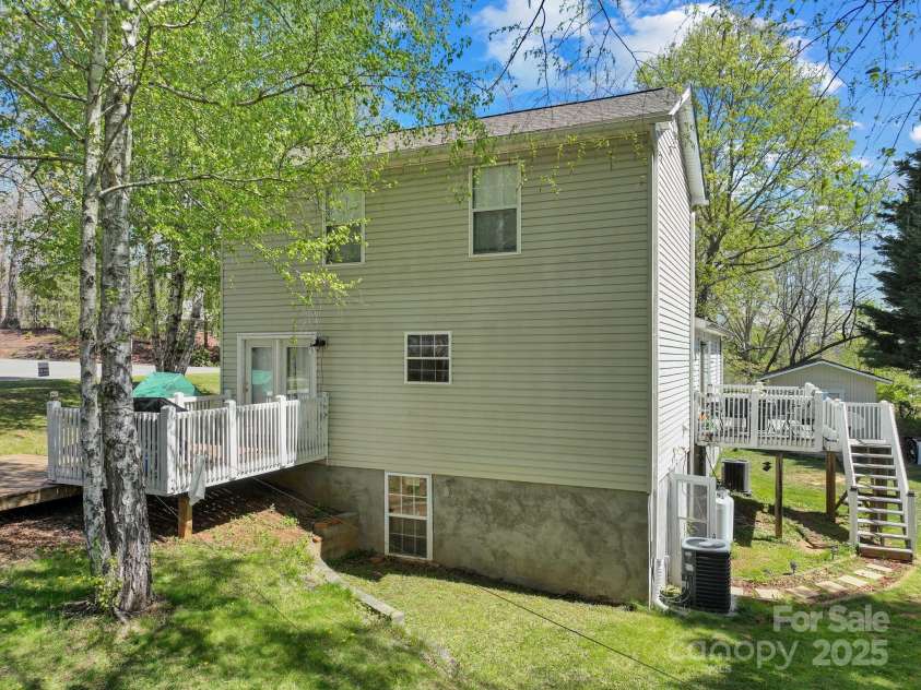 308 Browntown Road, Leicester, NC 28748.  MLS# CAR4216858, YatesRealty ID 13916. Entrance into basement