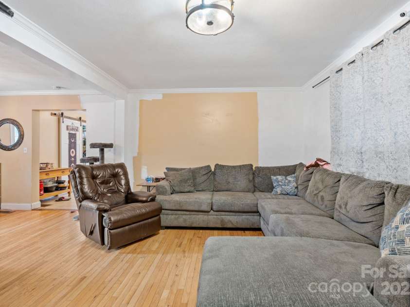 308 Browntown Road, Leicester, NC 28748.  MLS# CAR4216858, YatesRealty ID 13916. Large living Room open to dining room