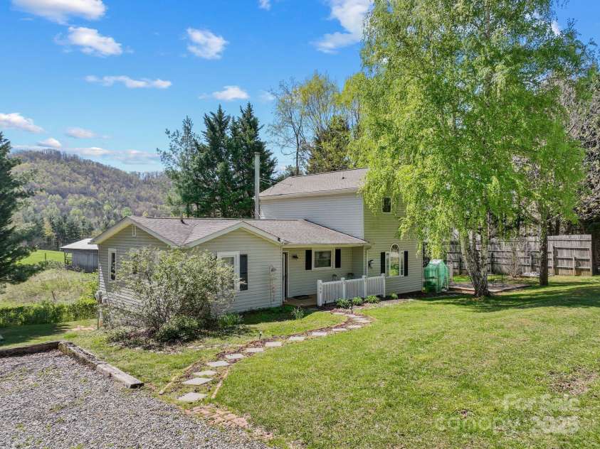 308 Browntown Road, Leicester, NC 28748.  MLS# CAR4216858, YatesRealty ID 13916. Lovely Farmhouse