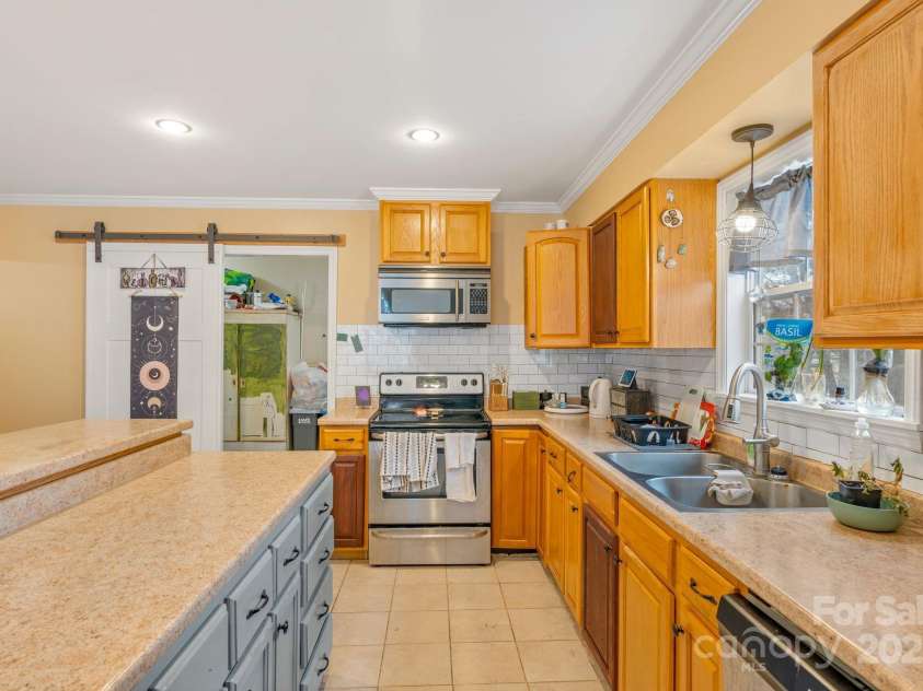 308 Browntown Road, Leicester, NC 28748.  MLS# CAR4216858, YatesRealty ID 13916. Plenty of cabinet space and counter space