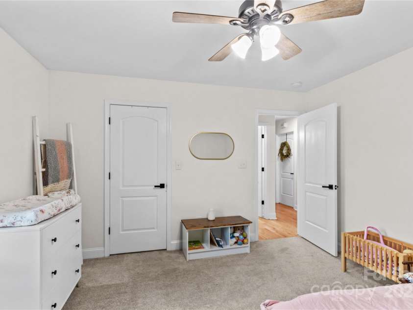 4336 Hunter Rhyne Road, Lincolnton, NC 28092.  MLS# CAR4257970, YatesRealty ID 13917. Bedroom 2, walk in closet, carpet and ceiling fan