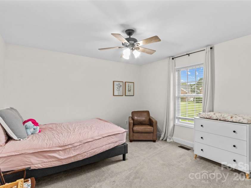 4336 Hunter Rhyne Road, Lincolnton, NC 28092.  MLS# CAR4257970, YatesRealty ID 13917. Bedroom 2 with walk in closet ( rear view)