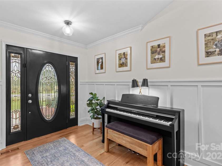 4336 Hunter Rhyne Road, Lincolnton, NC 28092.  MLS# CAR4257970, YatesRealty ID 13917. Entry, crown molding and board and batten accents