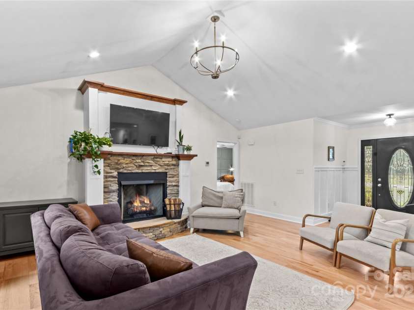 4336 Hunter Rhyne Road, Lincolnton, NC 28092.  MLS# CAR4257970, YatesRealty ID 13917. Family room with beautiful natural wood flooring