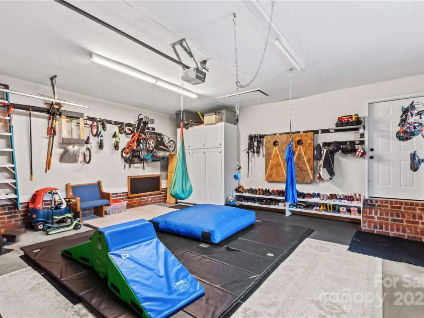 4336 Hunter Rhyne Road, Lincolnton, NC 28092.  MLS# CAR4257970, YatesRealty ID 13917. Garage set up as jungle gym (equipment does not convey) and drop zone.