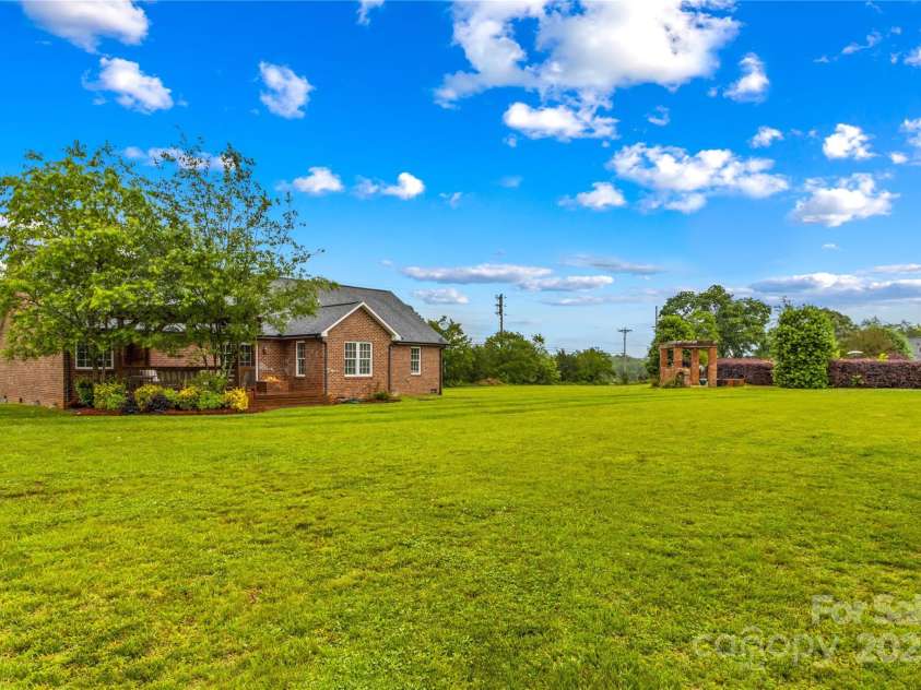 4336 Hunter Rhyne Road, Lincolnton, NC 28092.  MLS# CAR4257970, YatesRealty ID 13917. Rear yard, plenty of space between the neighbors