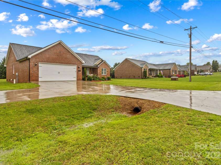 4336 Hunter Rhyne Road, Lincolnton, NC 28092.  MLS# CAR4257970, YatesRealty ID 13917. Street View with additional parking pad for your gatherings