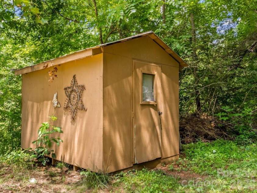1280 Old Mine Fork Road, Burnsville, NC 28714.  MLS# CAR4400499, YatesRealty ID 13919. Storage Building