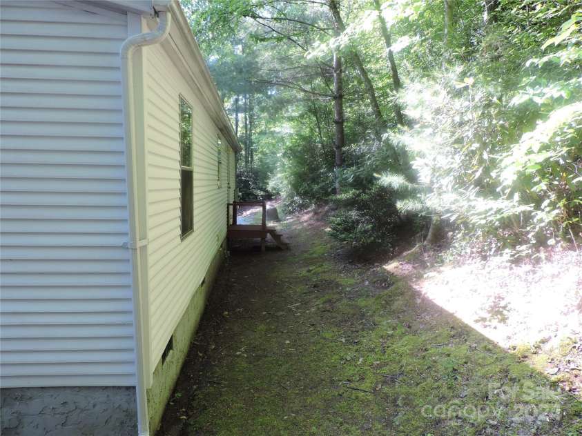 2271 Gouges Creek Road, Spruce Pine, NC 28777.  MLS# CAR4202059, YatesRealty ID 13919. Back of house