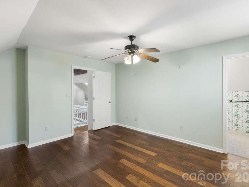 451 Crescent Trail, Highlands, NC 28741.  MLS# CAR4342214, YatesRealty ID 1392. Ensuite Guest Room on the Upper Level