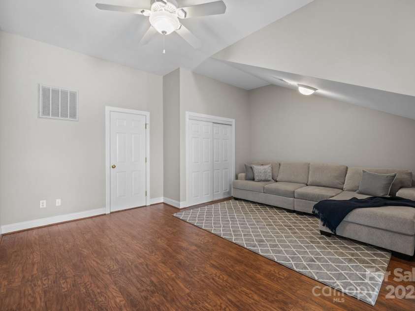 7543 Bluestar Lane, Charlotte, NC 28226.  MLS# CAR4220288, YatesRealty ID 1392. Middle door is the walk-in Attic