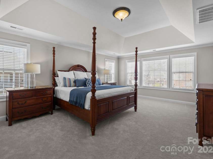 7543 Bluestar Lane, Charlotte, NC 28226.  MLS# CAR4220288, YatesRealty ID 1392. Primary bedroom with tray ceiling