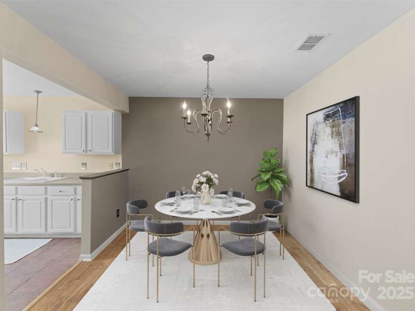 6635 Vlosi Drive, Charlotte, NC 28226.  MLS# CAR4235727, YatesRealty ID 13928. Virtually staged dining area