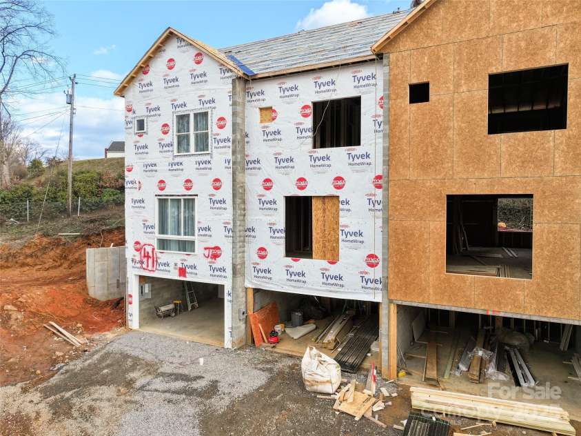 45 Richland Street, Waynesville, NC 28786.  MLS# CAR4331469, YatesRealty ID 1393. Construction; Subject is the second from the left