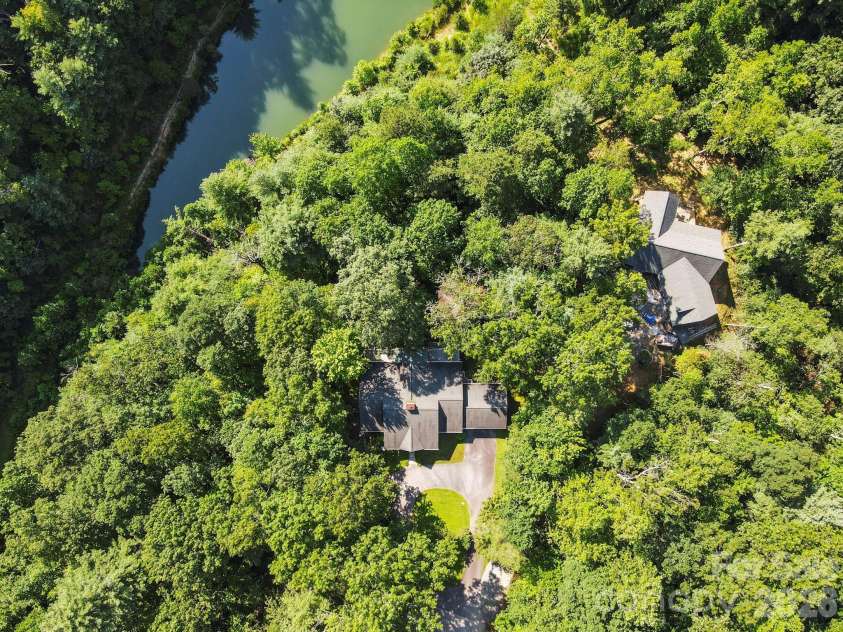 36 Macedonia West Drive, Saluda, NC 28773.  MLS# CAR4293153, YatesRealty ID 13938. Access to 2 lakes!