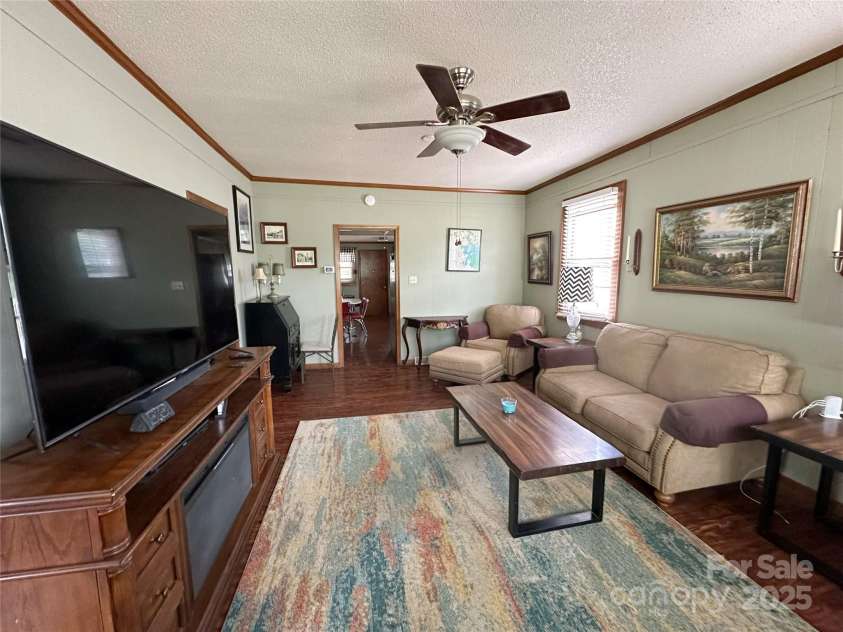 211 Spruce Street, Badin, NC 28009.  MLS# CAR4259443, YatesRealty ID 13945. 