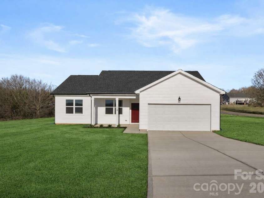 103 Willies Lane, Olin, NC 28660.  MLS# CAR4332219, YatesRealty ID 13950. Virtually staged to show how yard will look with grass
