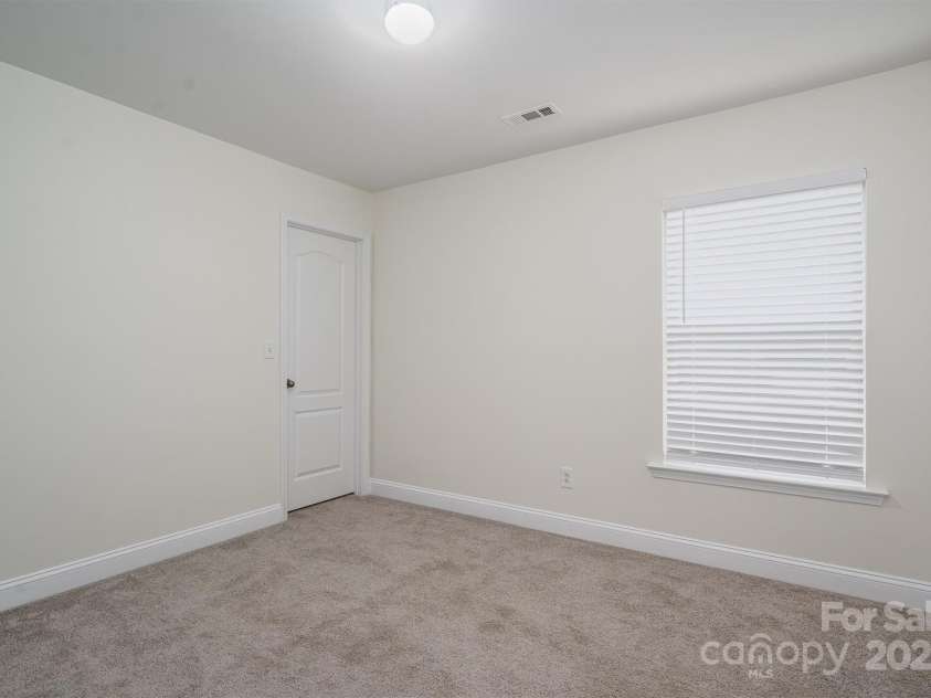 125 Colville Road, Mooresville, NC 28117.  MLS# CAR4240810, YatesRealty ID 13954. Bedroom 2