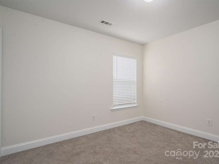 125 Colville Road, Mooresville, NC 28117.  MLS# CAR4240810, YatesRealty ID 13954. Bedroom 2