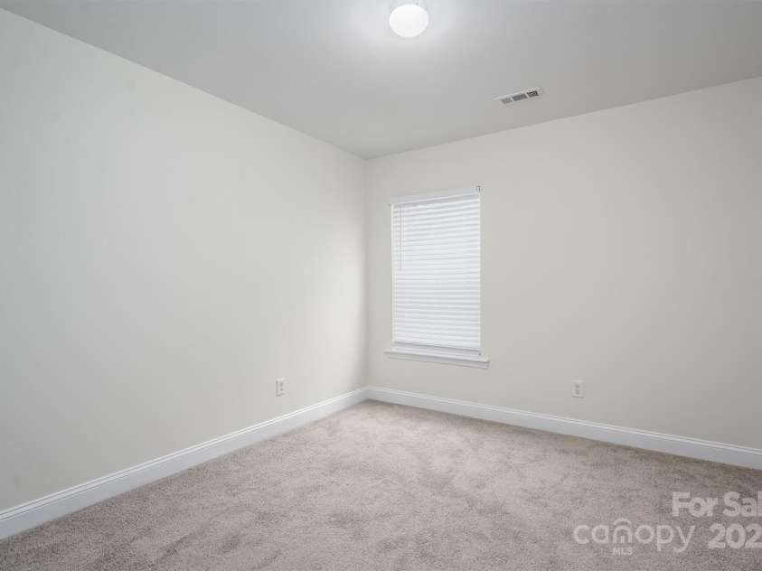 125 Colville Road, Mooresville, NC 28117.  MLS# CAR4240810, YatesRealty ID 13954. Bedroom 3