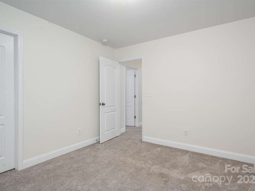 125 Colville Road, Mooresville, NC 28117.  MLS# CAR4240810, YatesRealty ID 13954. Bedroom 3