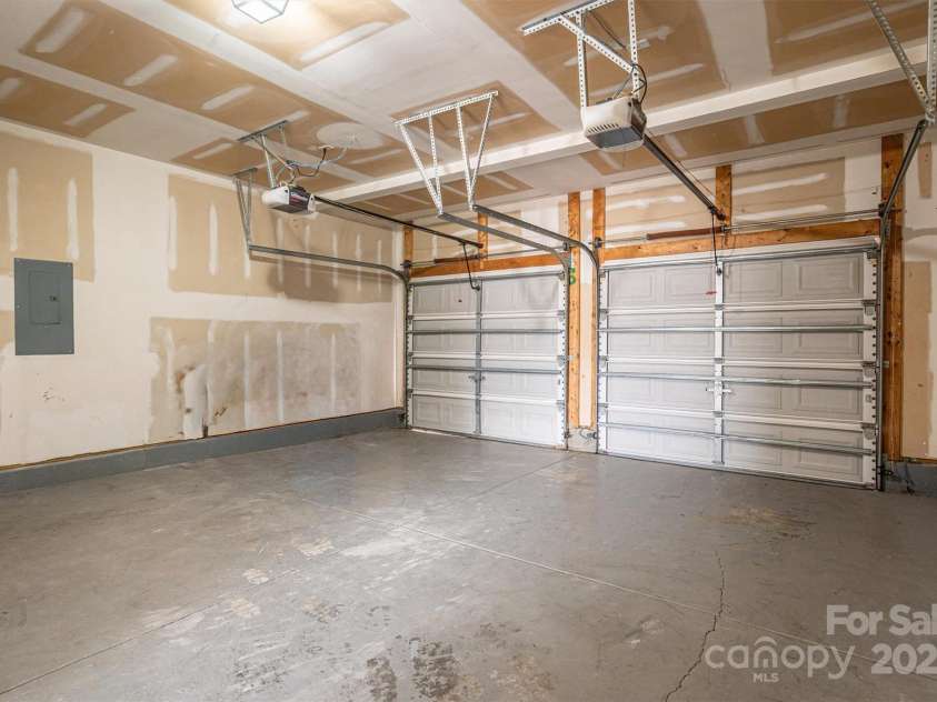 125 Colville Road, Mooresville, NC 28117.  MLS# CAR4240810, YatesRealty ID 13954. Garage
