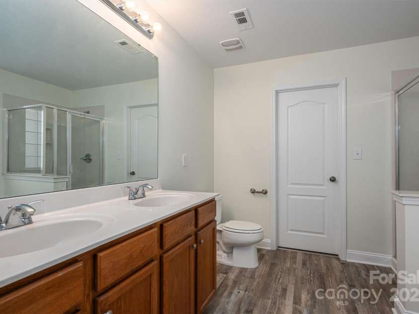 125 Colville Road, Mooresville, NC 28117.  MLS# CAR4240810, YatesRealty ID 13954. Primary Bath