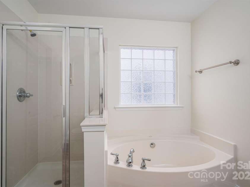 125 Colville Road, Mooresville, NC 28117.  MLS# CAR4240810, YatesRealty ID 13954. Primary Bath