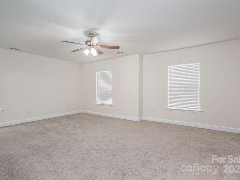 125 Colville Road, Mooresville, NC 28117.  MLS# CAR4240810, YatesRealty ID 13954. Primary Bedroom