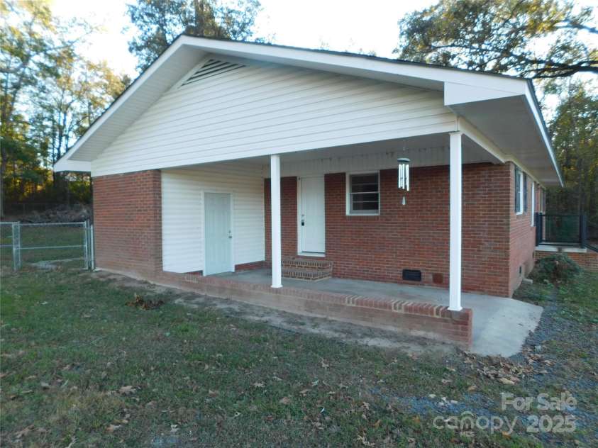 8600 Highway 74 Highway, Marshville, NC 28103.  MLS# CAR4312582, YatesRealty ID 1396. Carport