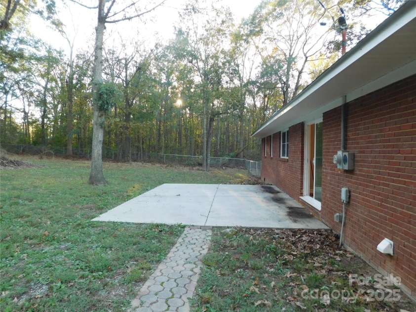8600 Highway 74 Highway, Marshville, NC 28103.  MLS# CAR4312582, YatesRealty ID 1396. Patio on rear