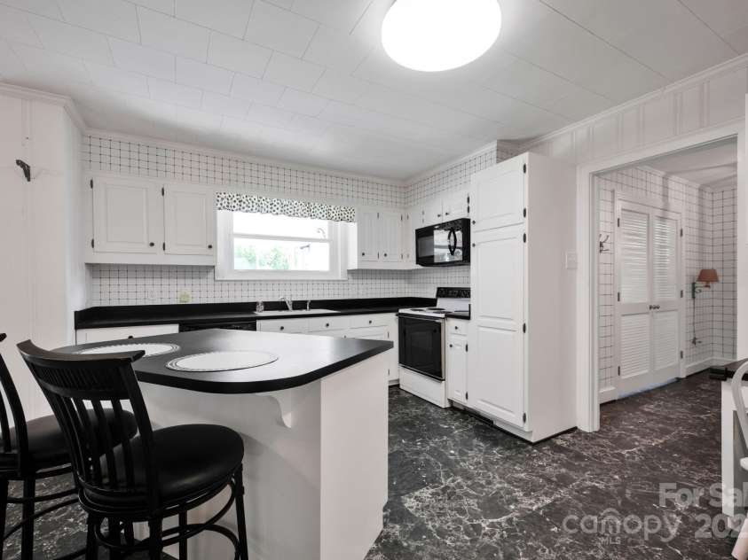 335&315 Graham Road, Mt Ulla, NC 28125.  MLS# CAR4256770, YatesRealty ID 13961. Main house