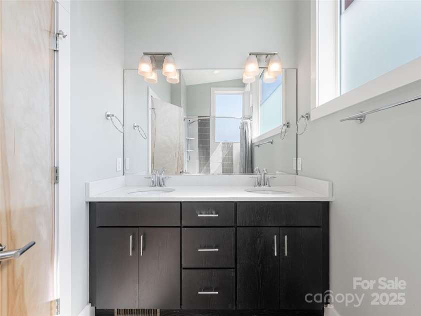 7 Mauricet Lane, Asheville, NC 28806.  MLS# CAR4241872, YatesRealty ID 13963. Double vanity upstairs bath