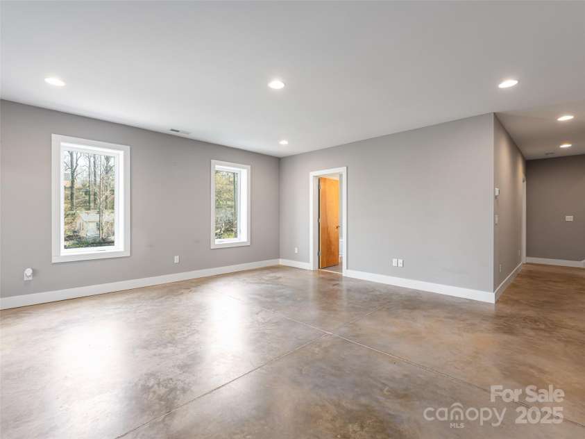 7 Mauricet Lane, Asheville, NC 28806.  MLS# CAR4241872, YatesRealty ID 13963. Polished Concrete floors