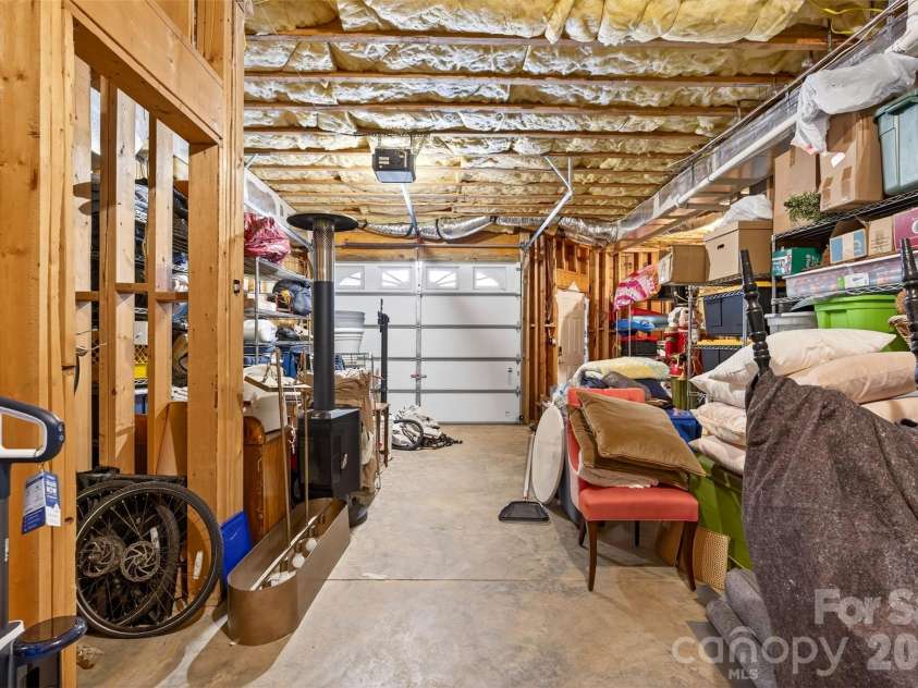 823 Inverness Circle, Spartanburg, SC 29306.  MLS# CAR4321073, YatesRealty ID 13966. Lower level storage & golf cart garage