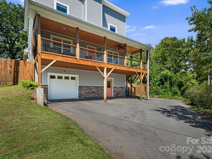 14 3rd Street, Asheville, NC 28803.  MLS# CAR4297140, YatesRealty ID 1397. One car garage with EV car charger accessible