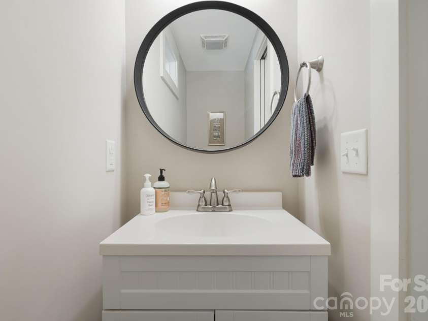 14 3rd Street, Asheville, NC 28803.  MLS# CAR4398696, YatesRealty ID 1397. Half bathroom on main level
