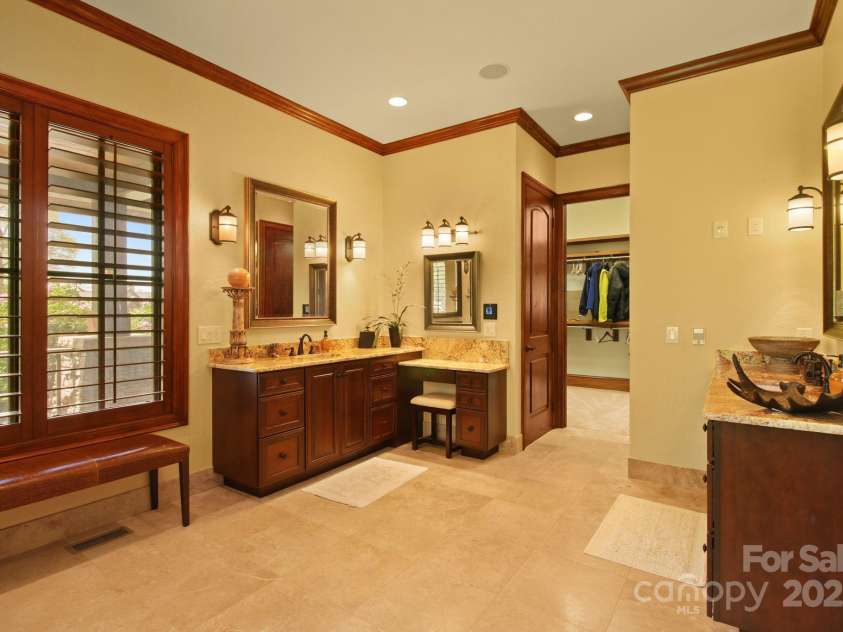 693 Thunderhill Trail, Blowing Rock, NC 28605.  MLS# CAR4253716, YatesRealty ID 13972. Primary suite bath & large walk-in closet