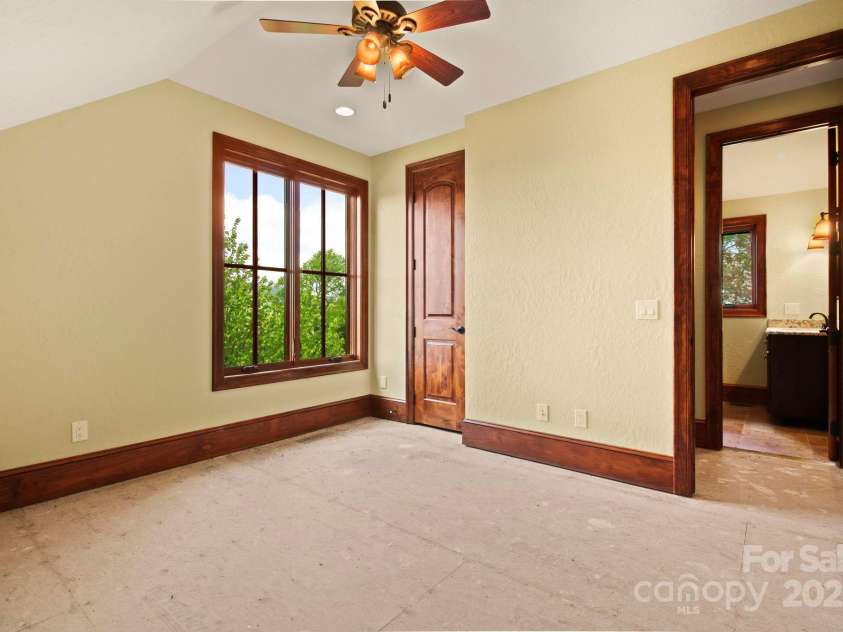 693 Thunderhill Trail, Blowing Rock, NC 28605.  MLS# CAR4253716, YatesRealty ID 13972. Unfinished above-garage apartment